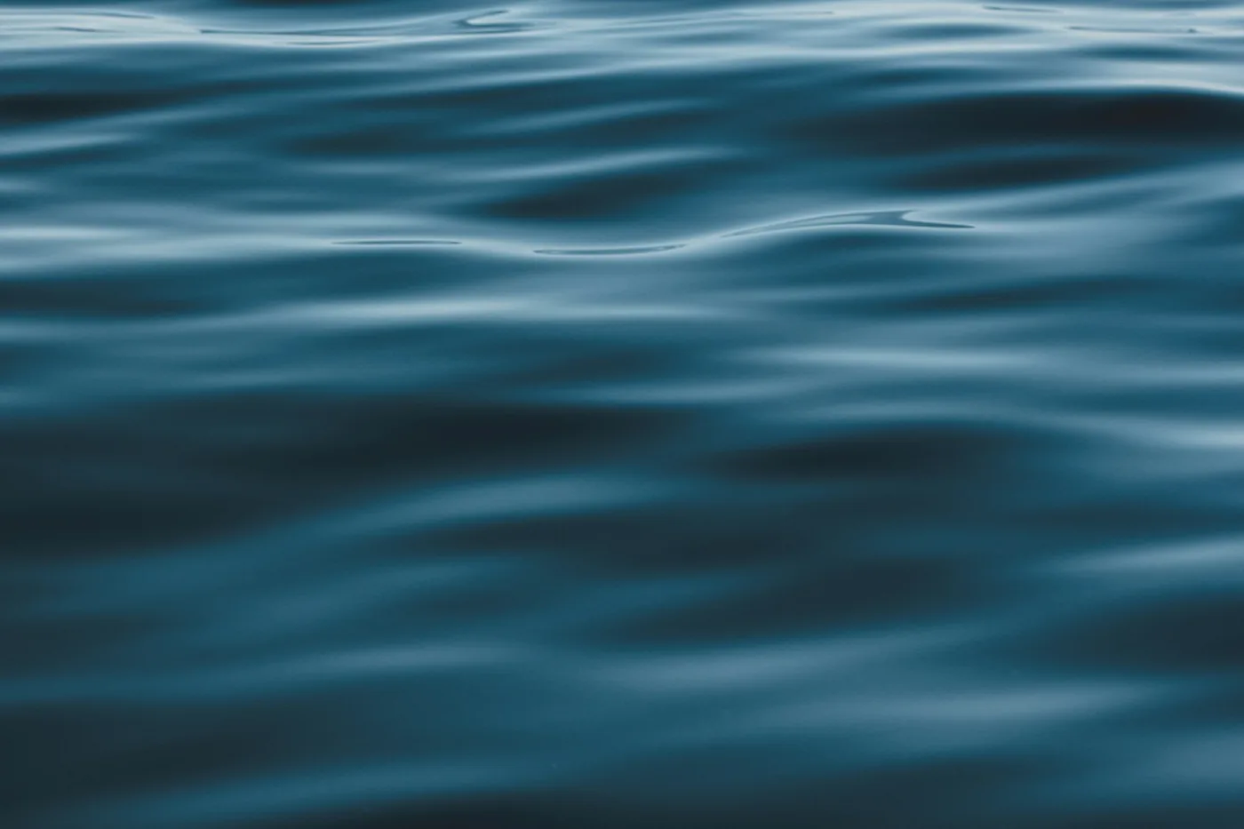 Shallow water over pale sand, ordinary and clear.